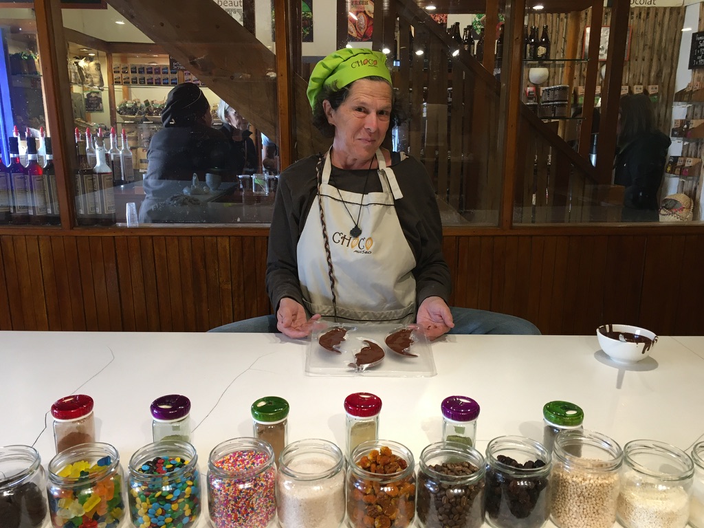 Chocolate maker at a worktable